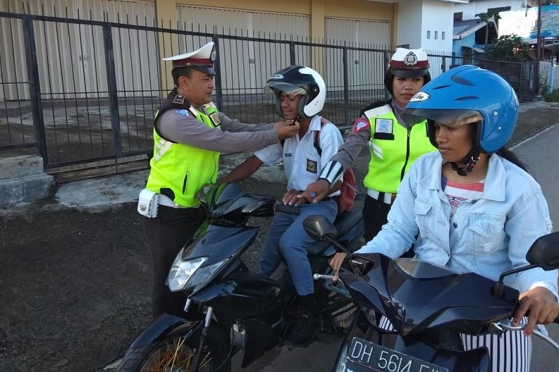 Tinjauan Historis dan Yuridis Penggunaan Helm di Indonesia